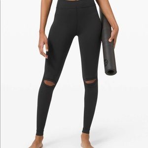 Lululemon leggings. Fun knee cut outs, make for a cute legging for barre class.